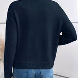 Céline – Knitted blouse with elegant lace collar