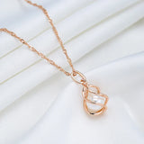 Exklusivt Geometriskt Halsband med Roséguld och Pärlor