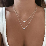 Elegant halsband med hjärta och pärlor